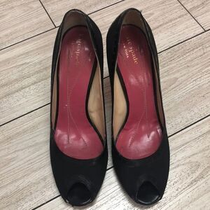 Kate Spade peep toe black pumps. Made in Italy 7.5